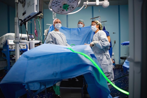 Medical gowns being quality checked before packaging